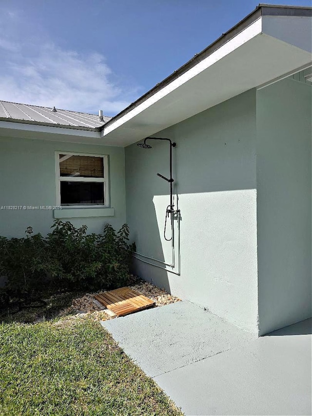 8994 SE Colony St, Hobe Sound, FL 33455 - doorway to property featuring stucco siding