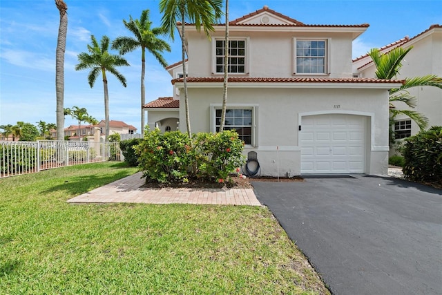 1115 SW 180th Ter, Pembroke Pines, FL 33029 - mediterranean / spanish house featuring driveway, stucco siding, a tile roof, and a garage