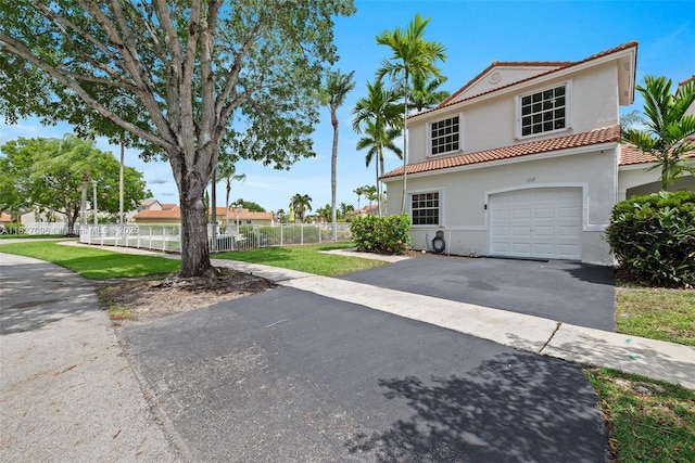 1115 SW 180th Ter, Pembroke Pines, FL 33029 - view of front of house featuring a tile roof, driveway, stucco siding, and a garage