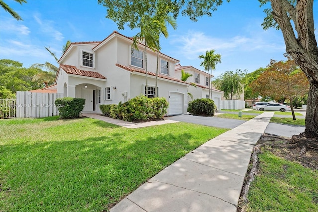 1115 SW 180th Ter, Pembroke Pines, FL 33029 - mediterranean / spanish house with driveway, a tiled roof, stucco siding, and an attached garage