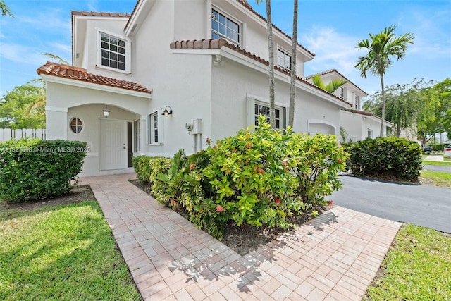 1115 SW 180th Ter, Pembroke Pines, FL 33029 - mediterranean / spanish home with a tile roof and stucco siding