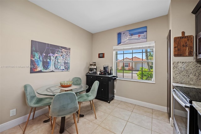 1115 SW 180th Ter, Pembroke Pines, FL 33029 - dining room with light tile patterned floors