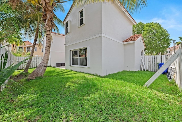 1115 SW 180th Ter, Pembroke Pines, FL 33029 - rear view of property with stucco siding and a tiled roof