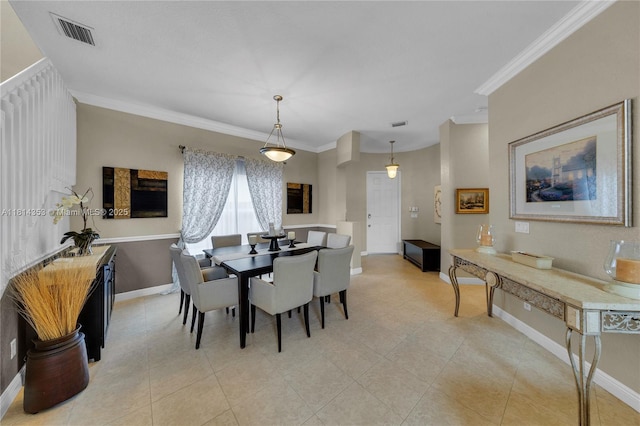 14141 SW 54th St, Miramar, FL 33027 - dining space with crown molding and light tile patterned flooring