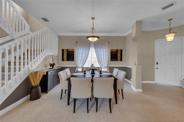 14141 SW 54th St, Miramar, FL 33027 - dining space featuring stairway, light tile patterned floors, and crown molding