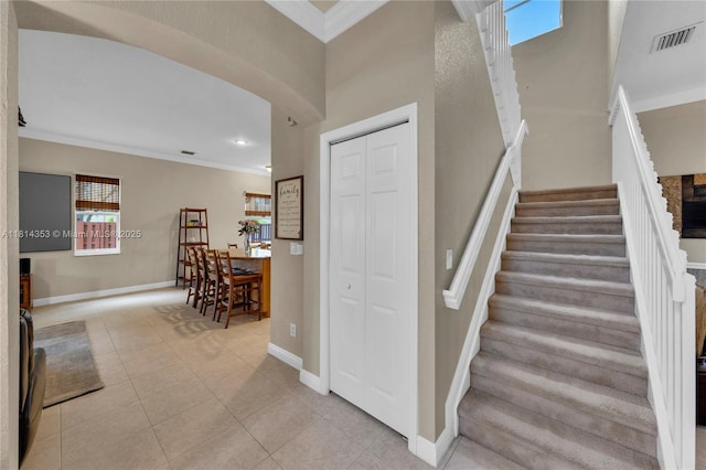 14141 SW 54th St, Miramar, FL 33027 - stairway with crown molding, tile patterned flooring, plenty of natural light, and recessed lighting