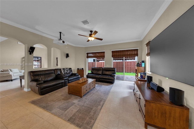 14141 SW 54th St, Miramar, FL 33027 - living room featuring arched walkways, light tile patterned floors, ceiling fan, ornamental molding, and plenty of natural light