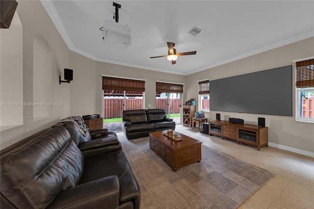 14141 SW 54th St, Miramar, FL 33027 - living area with light tile patterned flooring, crown molding, ceiling fan, plenty of natural light, and arched walkways