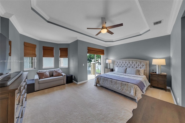 14141 SW 54th St, Miramar, FL 33027 - bedroom with access to outside, a tray ceiling, ornamental molding, ceiling fan, and light carpet