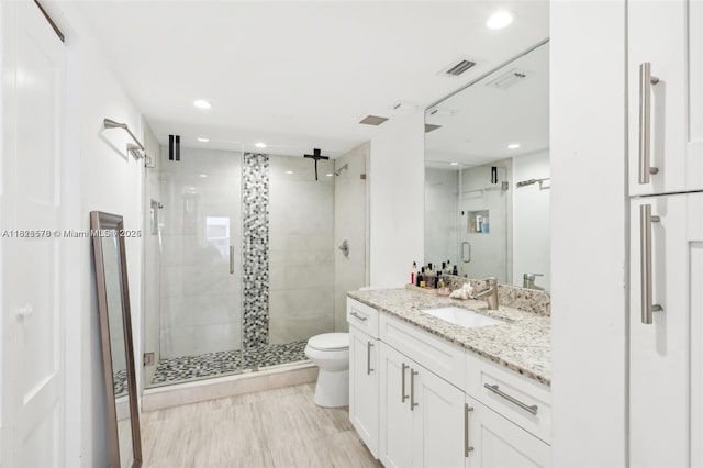 2401 Collins Ave Unit 1011, Miami Beach, FL 33140 - bathroom with a stall shower, vanity, and recessed lighting