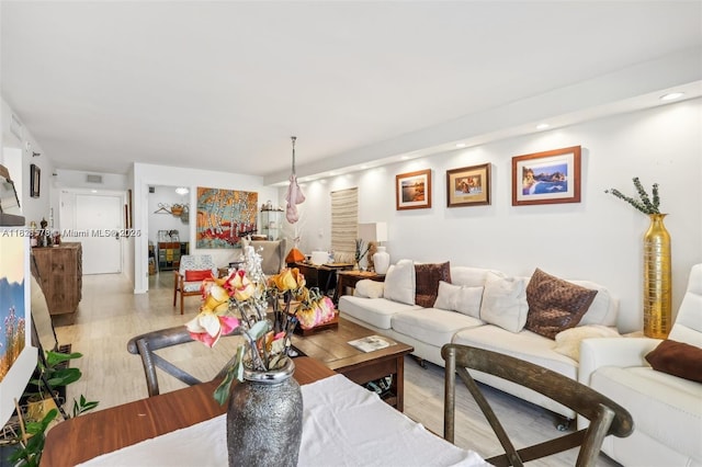 2401 Collins Ave Unit 1011, Miami Beach, FL 33140 - living area featuring light wood finished floors and recessed lighting