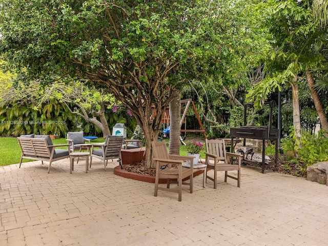 6005 SW 135th Ter, Pinecrest, FL 33156 - view of patio featuring an outdoor living space