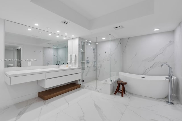 3301 NE 183rd St Unit 1803, Aventura, FL 33160 - full bath with marble tiled flooring, recessed lighting, a marble finish shower, a freestanding tub, and vanity