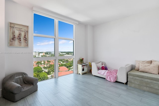 3301 NE 183rd St Unit 1803, Aventura, FL 33160 - living area featuring wood finished floors and floor to ceiling windows