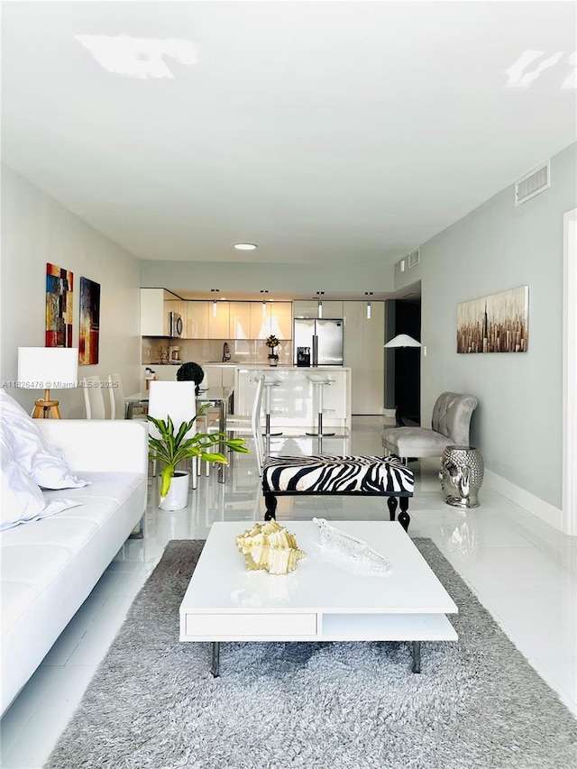 19390 Collins Ave Unit 911, Sunny Isles Beach, FL 33160 - living room featuring baseboards