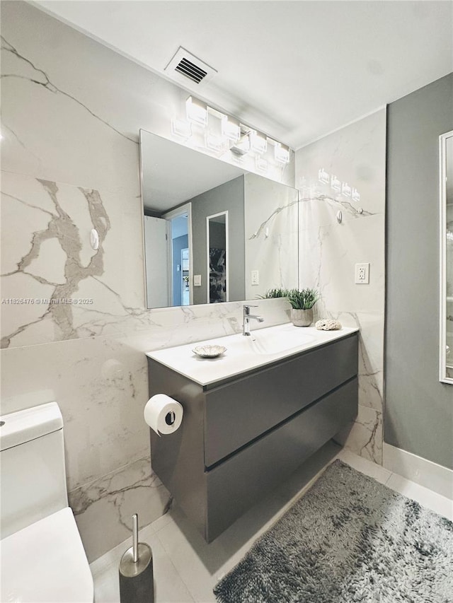 19390 Collins Ave Unit 911, Sunny Isles Beach, FL 33160 - bathroom with marble finish flooring and vanity