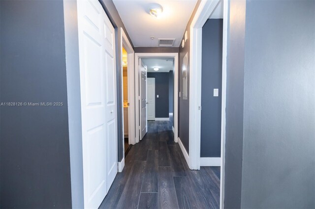 888 S Douglas Rd Unit Ph07, Coral Gables, FL 33134 - hallway with dark wood finished floors and baseboards
