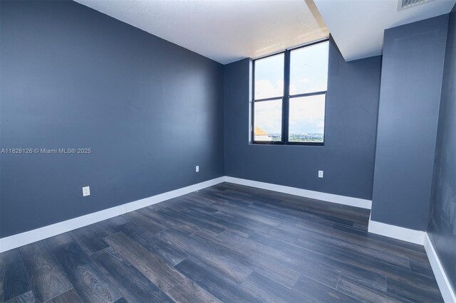888 S Douglas Rd Unit Ph07, Coral Gables, FL 33134 - empty room featuring dark wood-style flooring