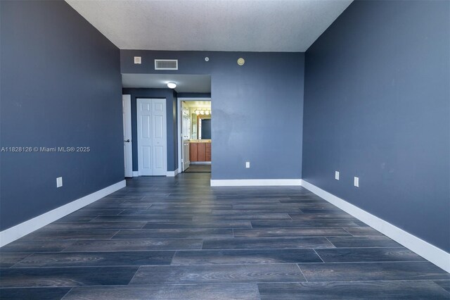 888 S Douglas Rd Unit Ph07, Coral Gables, FL 33134 - unfurnished room featuring wood finished floors and baseboards