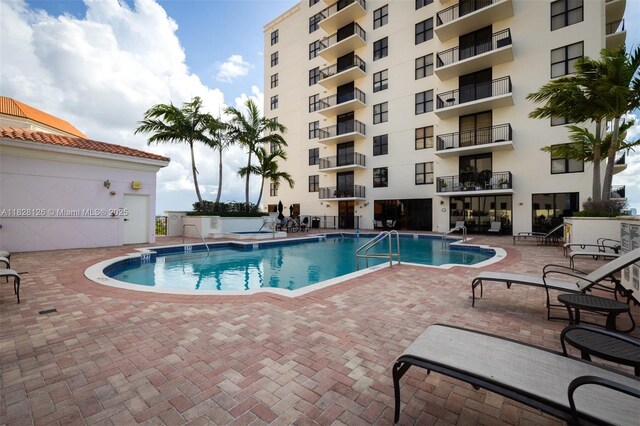 888 S Douglas Rd Unit Ph07, Coral Gables, FL 33134 - community pool with a patio