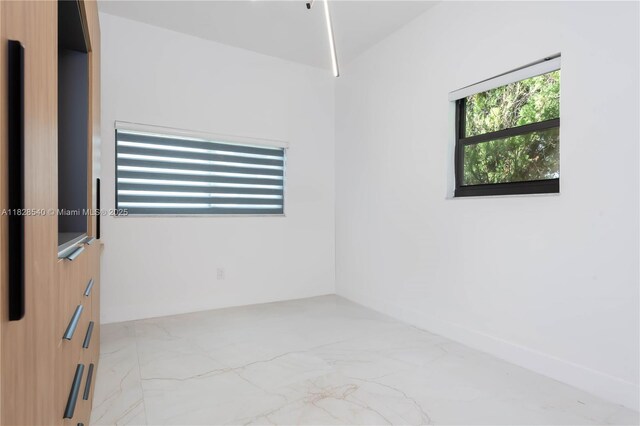 2181 SW 20th St, Miami, FL 33145 - empty room featuring marble finish flooring