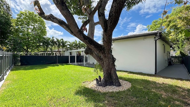2181 SW 20th St, Miami, FL 33145 - fenced backyard featuring a patio area