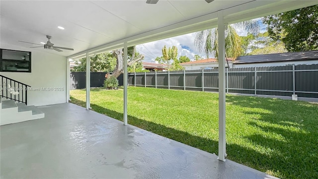 2181 SW 20th St, Miami, FL 33145 - fenced backyard with ceiling fan and a patio