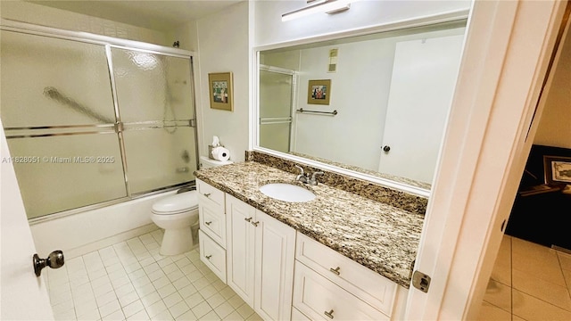 6080 Huntwick Ter Unit 305, Delray Beach, FL 33484 - bathroom with tile patterned flooring, vanity, and combined bath / shower with glass door