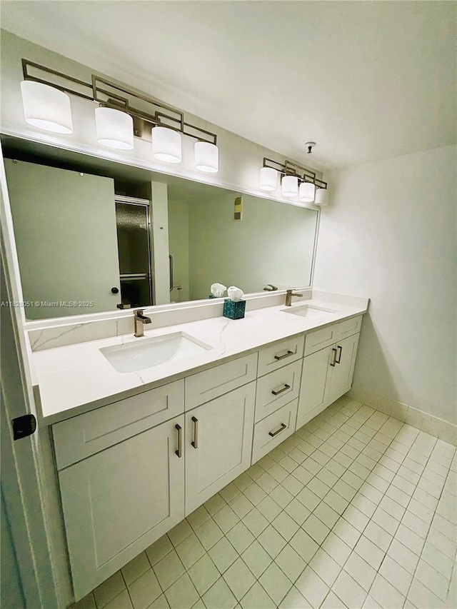6080 Huntwick Ter Unit 305, Delray Beach, FL 33484 - full bathroom with double vanity, tile patterned flooring, and a stall shower