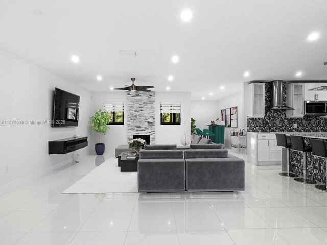 4501 SW 133rd Ave, Southwest Ranches, FL 33330 - living room with a ceiling fan, recessed lighting, and a large fireplace