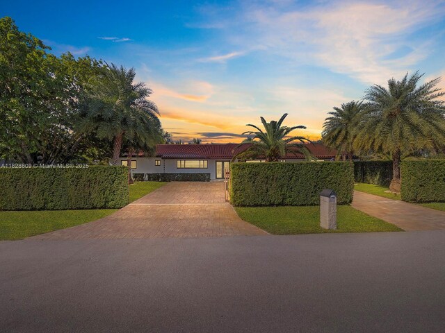 4501 SW 133rd Ave, Southwest Ranches, FL 33330 - view of front of home with decorative driveway, a tiled roof, and stucco siding