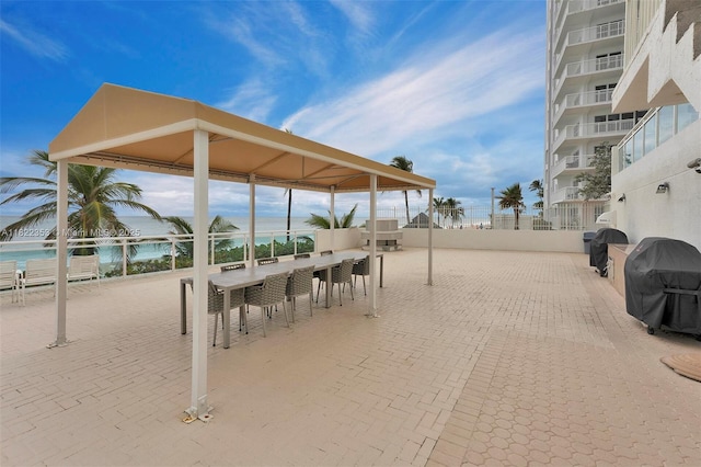 3900 Galt Ocean Dr Unit 506, Fort Lauderdale, FL 33308 - view of patio / terrace featuring a grill and a water view