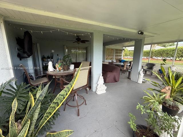 767 SE 22nd Dr, Homestead, FL 33033 - view of patio / terrace featuring outdoor dining space and a ceiling fan