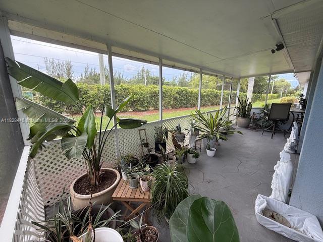 767 SE 22nd Dr, Homestead, FL 33033 - sunroom / solarium with healthy amount of natural light