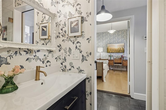 405 SW 29th Ct Unit 4A, Miami, FL 33135 - ensuite bathroom featuring wallpapered walls, vanity, and tile patterned floors