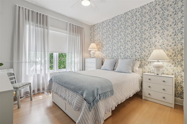 405 SW 29th Ct Unit 4A, Miami, FL 33135 - bedroom featuring wallpapered walls, wood finished floors, and ceiling fan