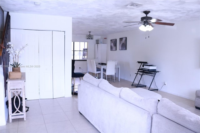 3370 Beau Rivage Dr, Pompano Beach, FL 33064 - living room with a ceiling fan and light tile patterned floors