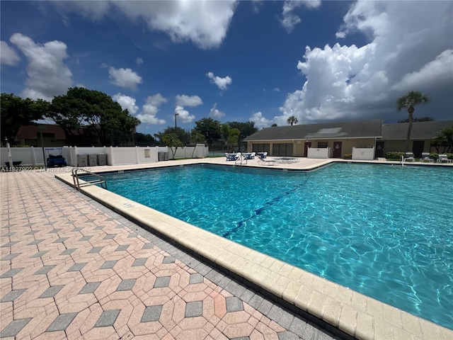 3370 Beau Rivage Dr, Pompano Beach, FL 33064 - community pool featuring a patio area