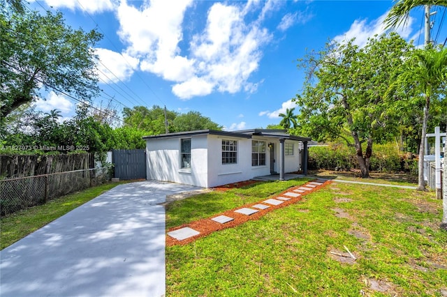 3494 SW 56th Ave, West Park, FL 33023 - view of front of house featuring stucco siding and driveway