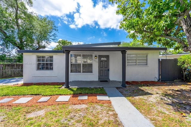 3494 SW 56th Ave, West Park, FL 33023 - view of front facade with stucco siding and covered porch