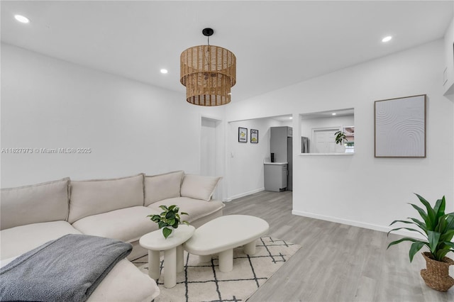 3494 SW 56th Ave, West Park, FL 33023 - living area with light wood-style flooring and recessed lighting