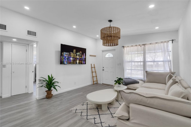 3494 SW 56th Ave, West Park, FL 33023 - living area with wood finished floors, a chandelier, and recessed lighting