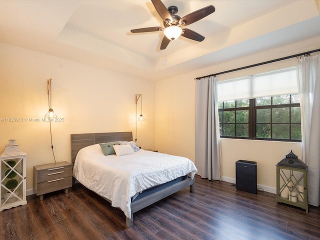 5656 NW 58th Ln, Tamarac, FL 33319 - bedroom featuring a tray ceiling, wood finished floors, and ceiling fan