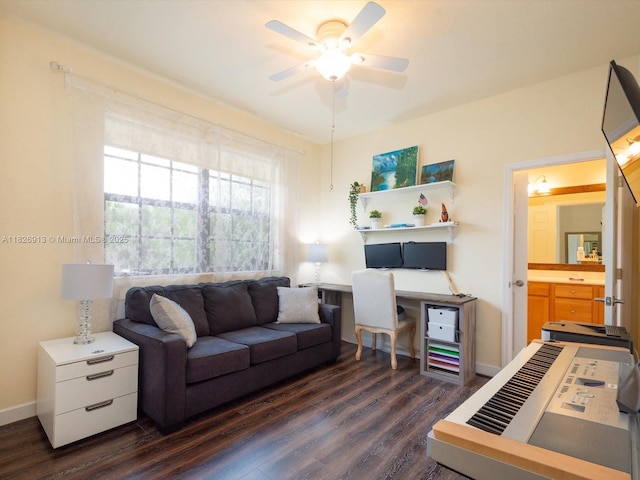 5656 NW 58th Ln, Tamarac, FL 33319 - living area with dark wood-type flooring, ceiling fan, and a desk