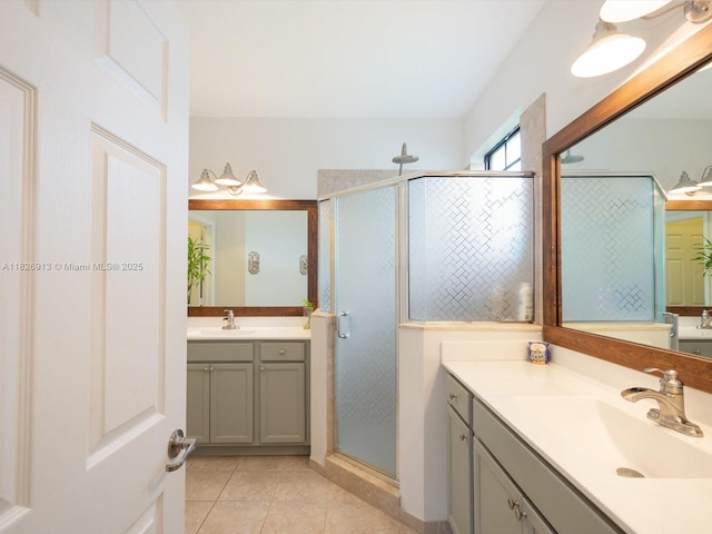 5656 NW 58th Ln, Tamarac, FL 33319 - bathroom featuring a stall shower, two vanities, and tile patterned flooring
