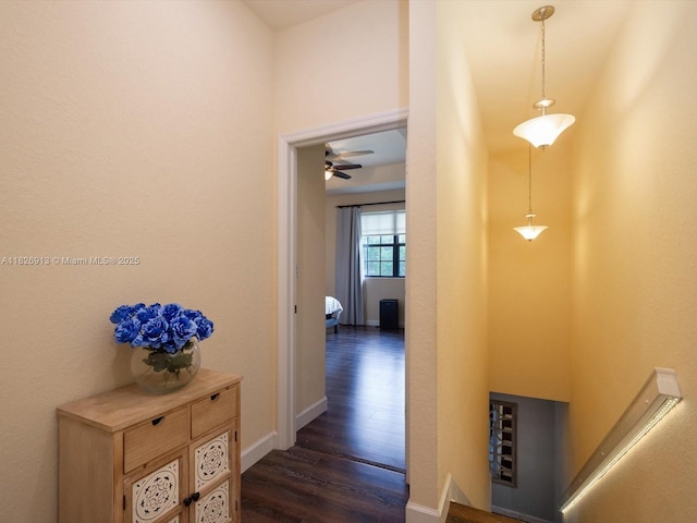5656 NW 58th Ln, Tamarac, FL 33319 - hallway featuring dark wood-type flooring and baseboards