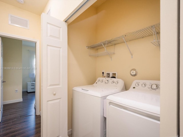 5656 NW 58th Ln, Tamarac, FL 33319 - laundry area featuring washer and dryer and dark wood-style floors