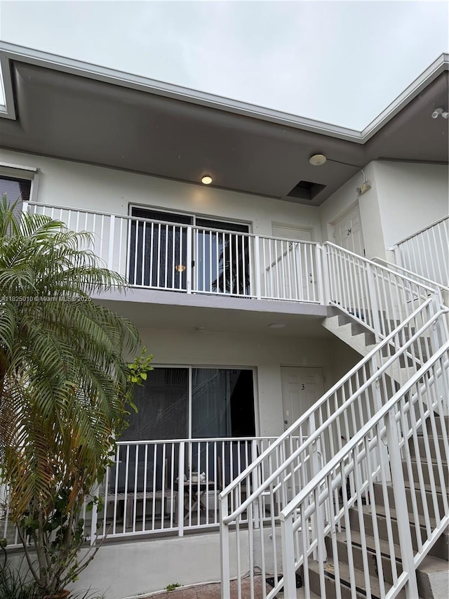 1142 99th St Unit 23, Bay Harbor Islands, FL 33154 - view of property featuring stairway
