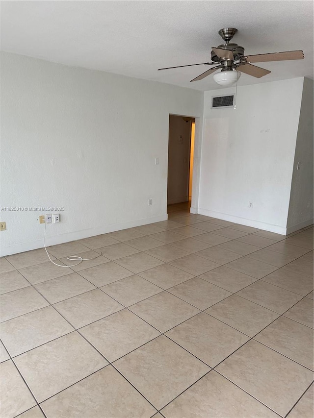 1142 99th St Unit 23, Bay Harbor Islands, FL 33154 - unfurnished room with ceiling fan and light tile patterned floors