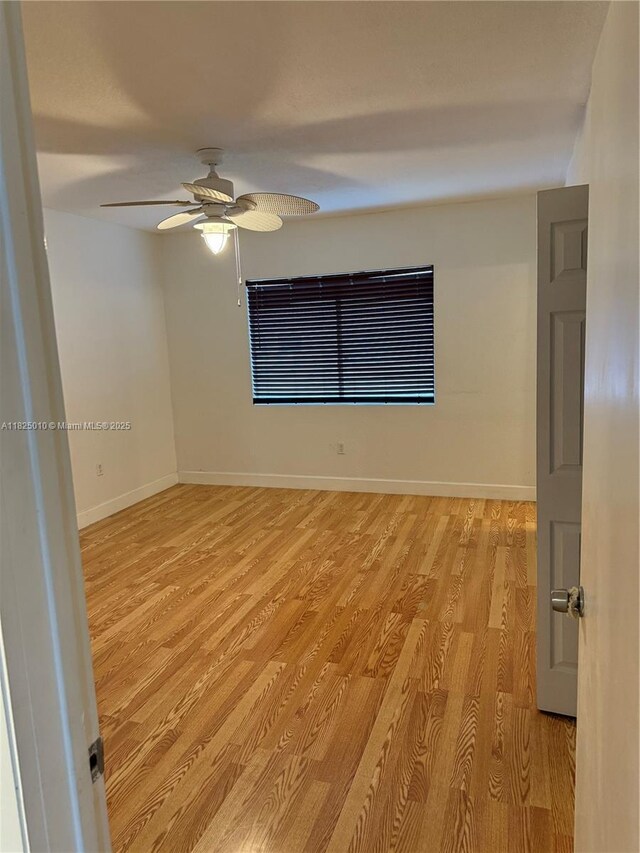 1142 99th St Unit 23, Bay Harbor Islands, FL 33154 - unfurnished room with light wood-type flooring and a ceiling fan